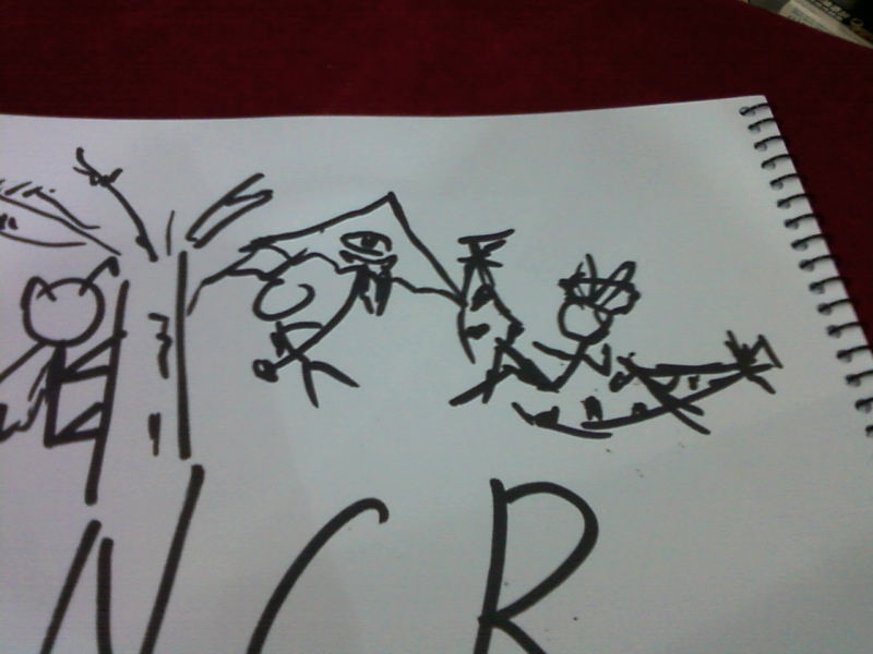 两个人在他摊上画的